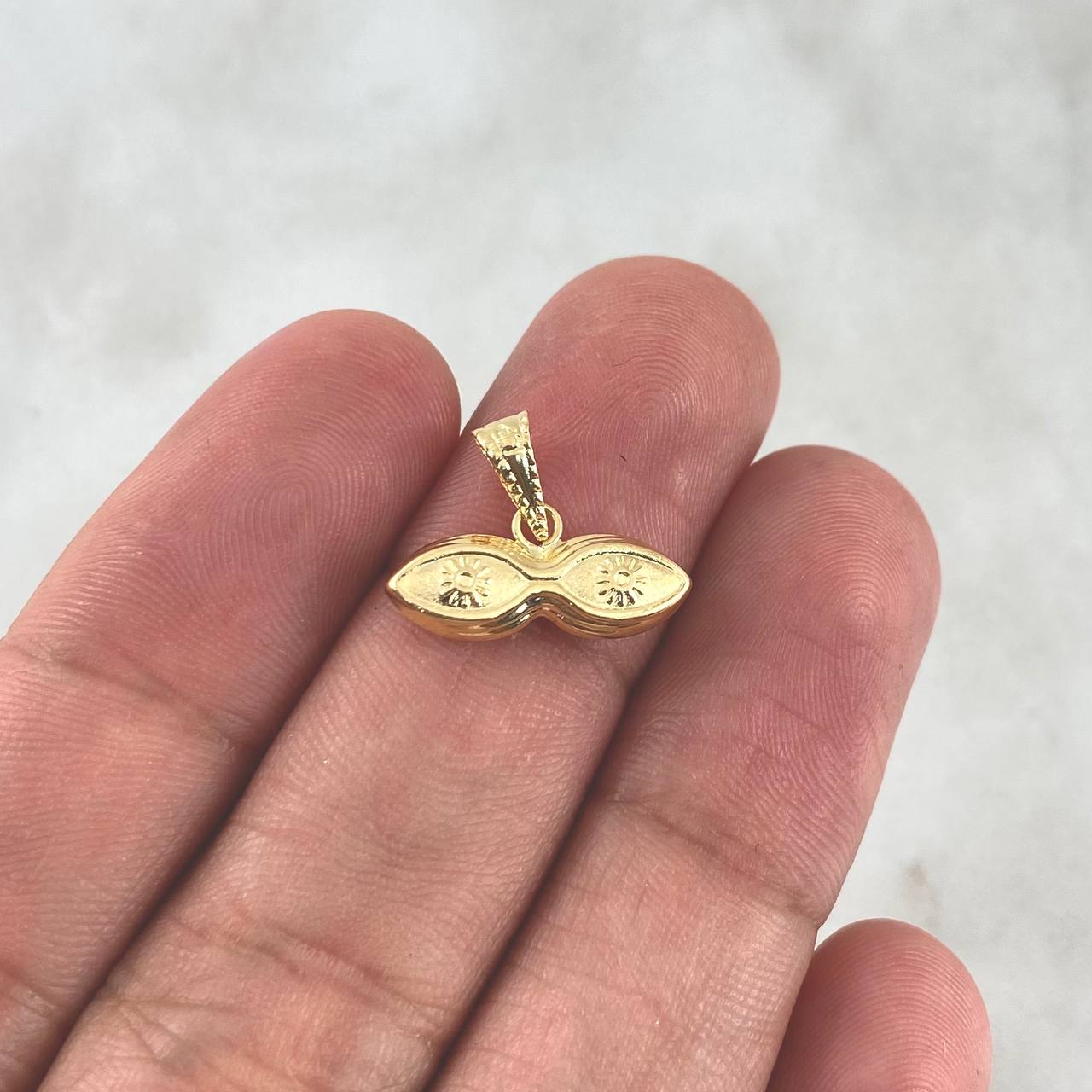 Dije Ojos De Santa Lucia 0.5gr / 1.3cm / Oro Amarillo 18K *