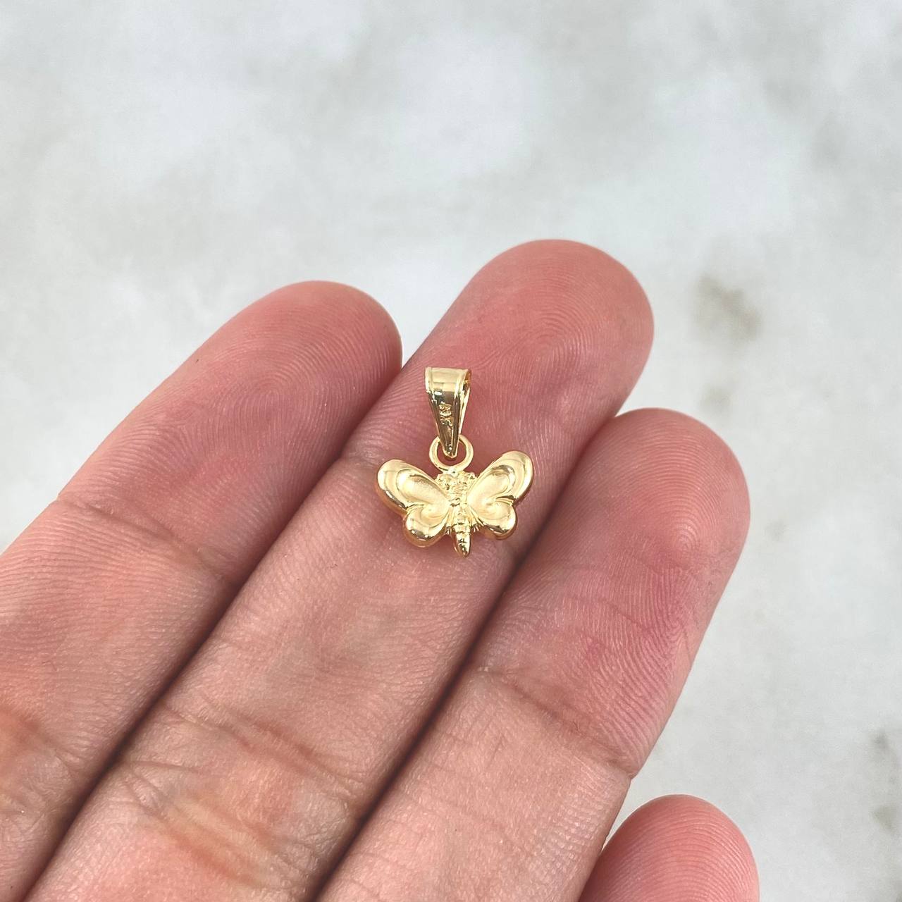 Dije Mariposa 0.45gr / 1.3cm / Troquelada Oro Amarillo ©