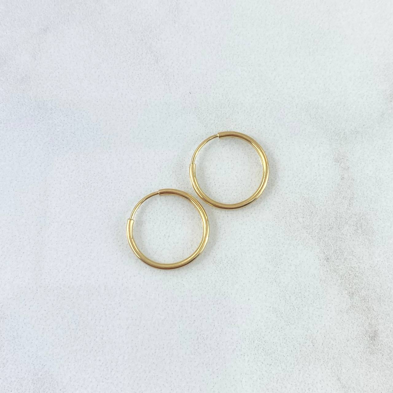 Candongas Aro 0.55gr / 1.4cm / Liso Oro Amarillo 18K