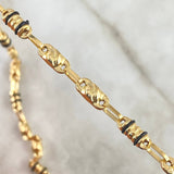 Cadena Rustica Barril Espiral 14.05gr / 60cm / 4.5mm Cauchos Negros Oro Amarillo