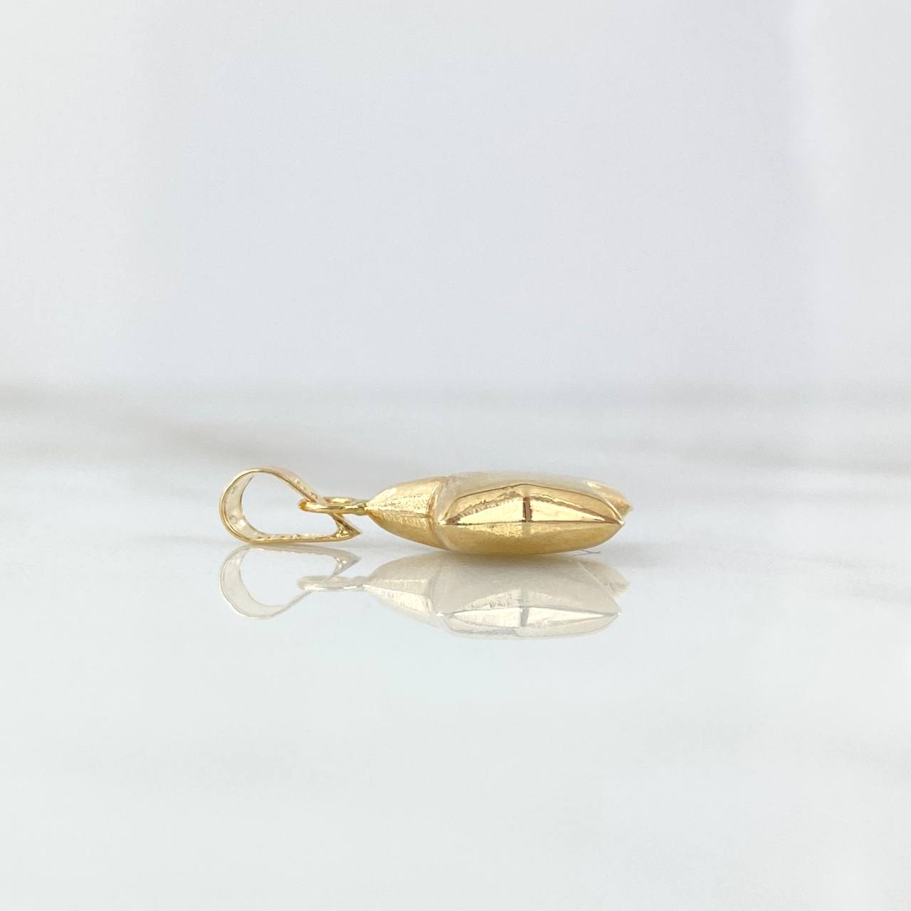 Dije Estrella 0.6gr / 2cm / Troquelado Oro Amarillo 18K *