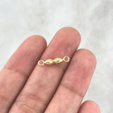 Herraje Ojos Santa Lucia 0.25gr / 1.5cm / Troquelado Liso Oro Amarillo ©