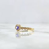 Anillo Solitario Linea de Corazones 2.5gr / T8 1/4 / Circones Blancos Y Morado Oro Amarillo