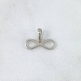 Dije Infinito 0.6gr / 1.2cm / Silueta Lisa Oro Blanco