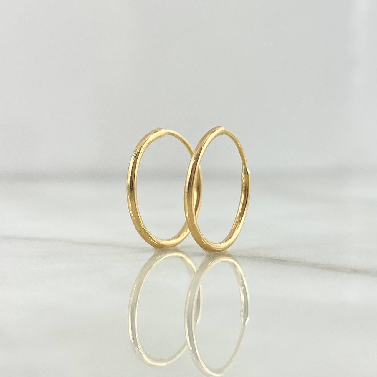 Candongas Aro 0.65gr / 1.5cm / Lisa Oro Amarillo 18K