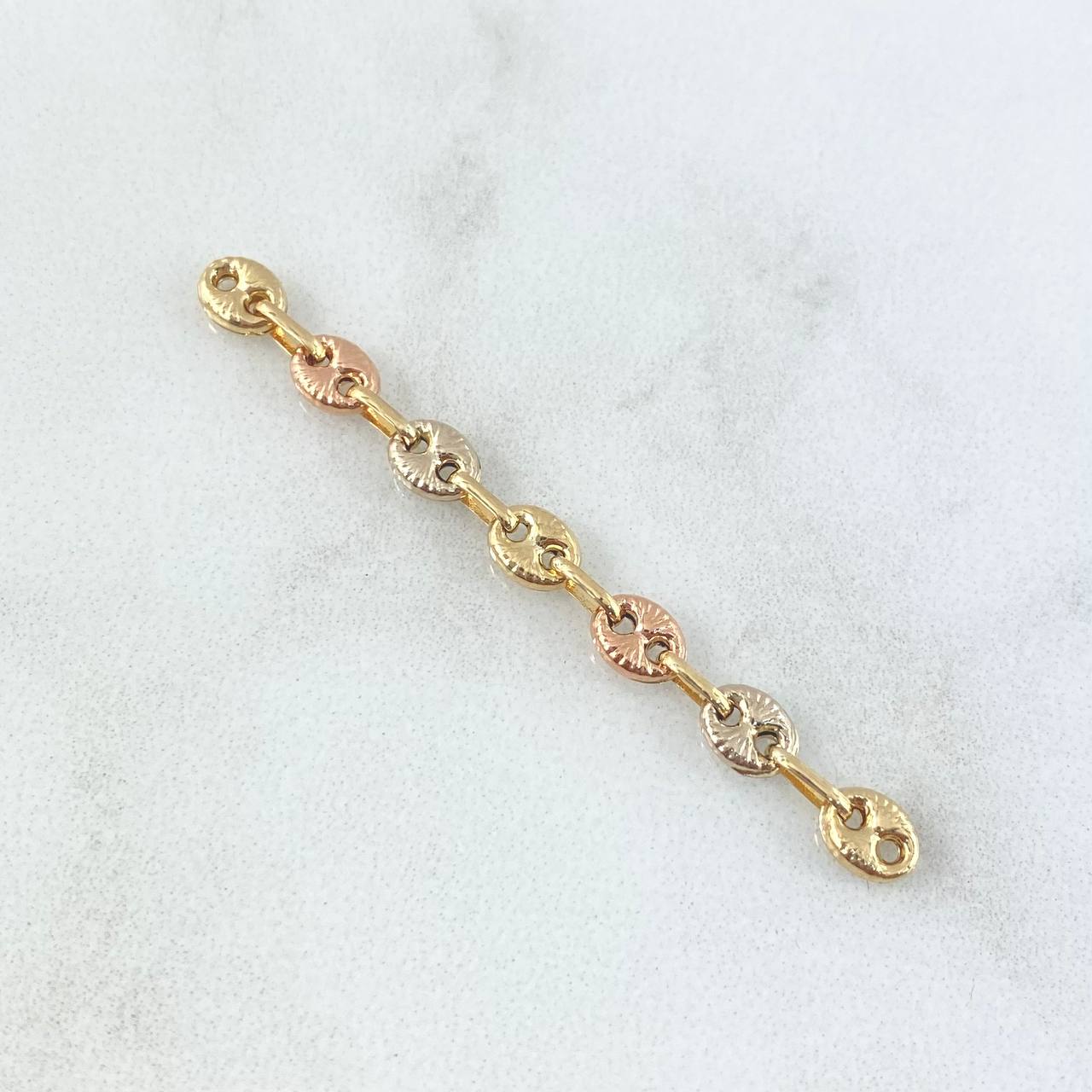 Herraje Retazo GC 0.65gr / 4cm / 4mm Seis Eslabones Lisos Tres Oros 18K