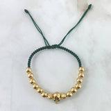 Pulsera Verde Calavera 4.8gr / 6mm Bolas Lisas - Diamantadas - Ojos Verdes Oro Amarillo 18K ©