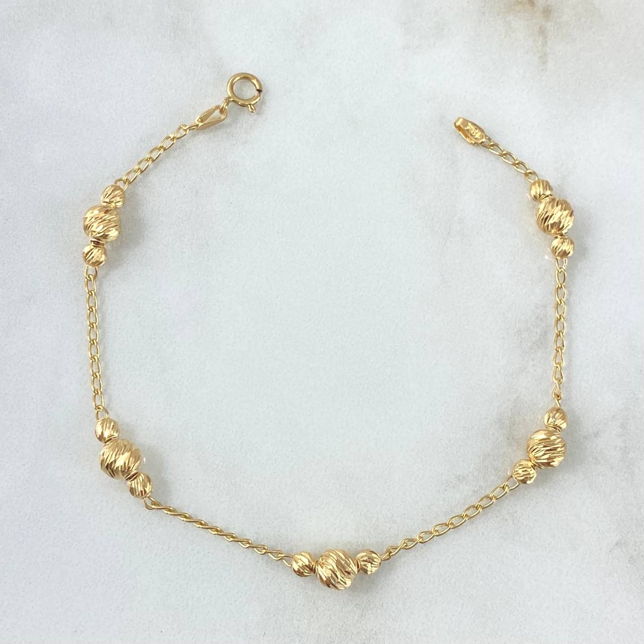 Pulso Aro Seguido Trio 2.55gr / 17.5cm / 3mm - 5mm Bolas Diamantadas Oro Amarillo 18K