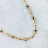 Cadena Rústica Barril 13.1gr / 60cm / 5mm Lisa - Rayada Cauchos Negros Oro Amarillo 18K ©