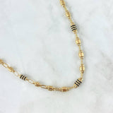 Cadena Rústica Barril 12.9gr / 60cm / 5mm Lisa - Rayada Cauchos Negros Oro Amarillo 18K