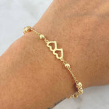 Pulso Aro Seguido Dos Corazones 3.15gr / 18cm / 3mm - 4mm Bolas Diamantadas Oro Amarillo 18K *
