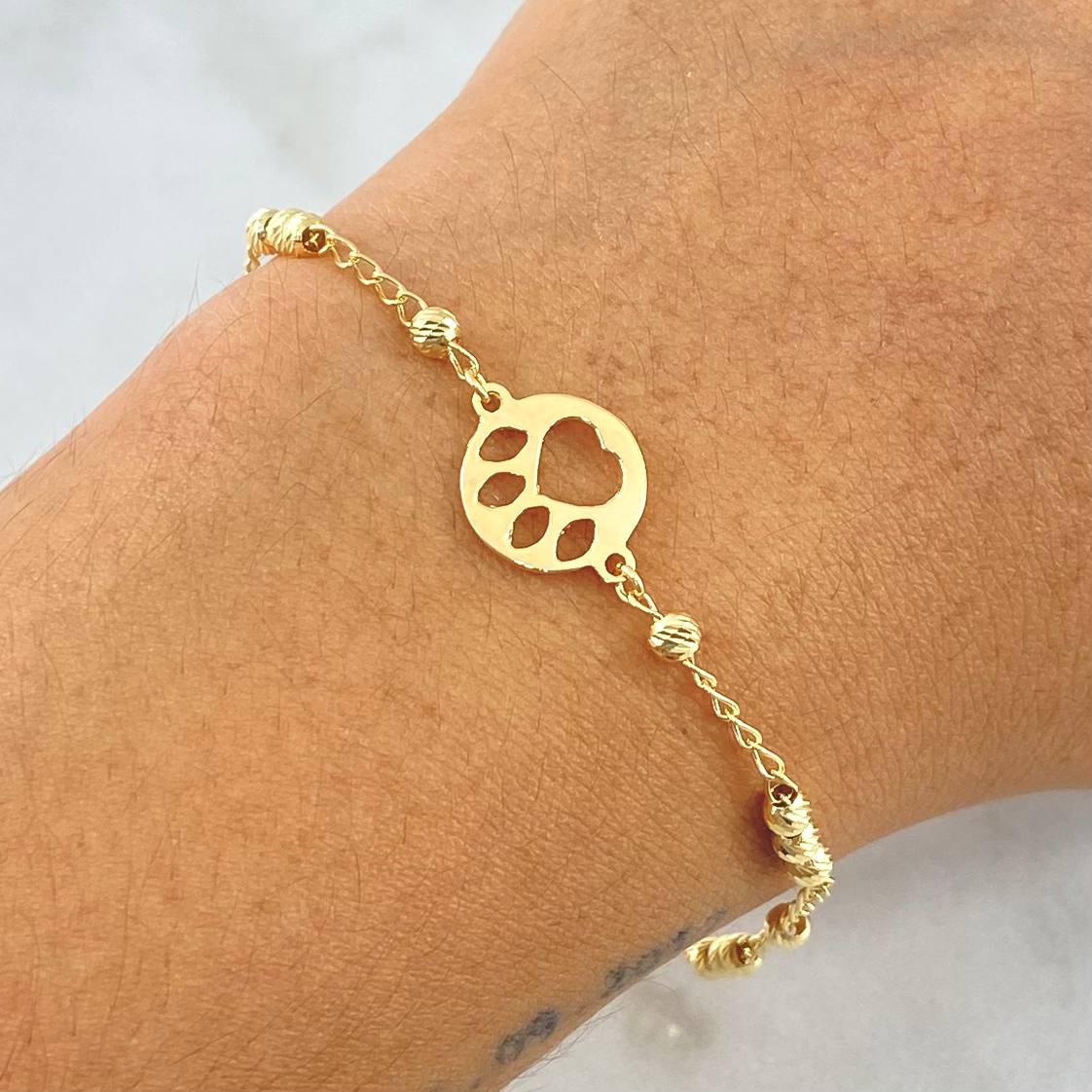 Pulso Aro Seguido Placa Huella 2.55gr / 18cm / 3mm Bolas Diamantadas Oro Amarillo 18K *