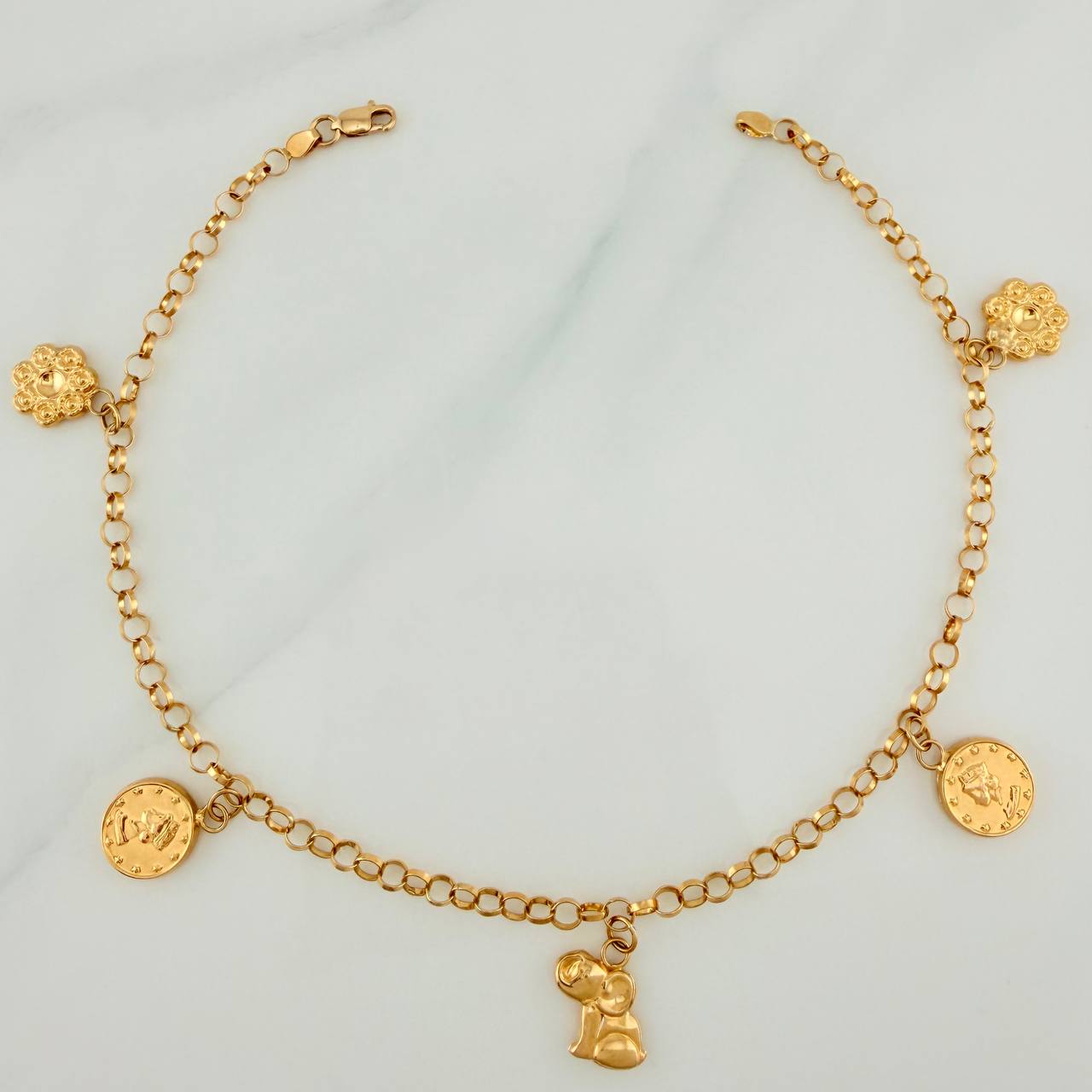 Tobillera Aro Seguido Dijes 5.85gr / 26.5cm / 2.97mm Oro Amarillo 18K %