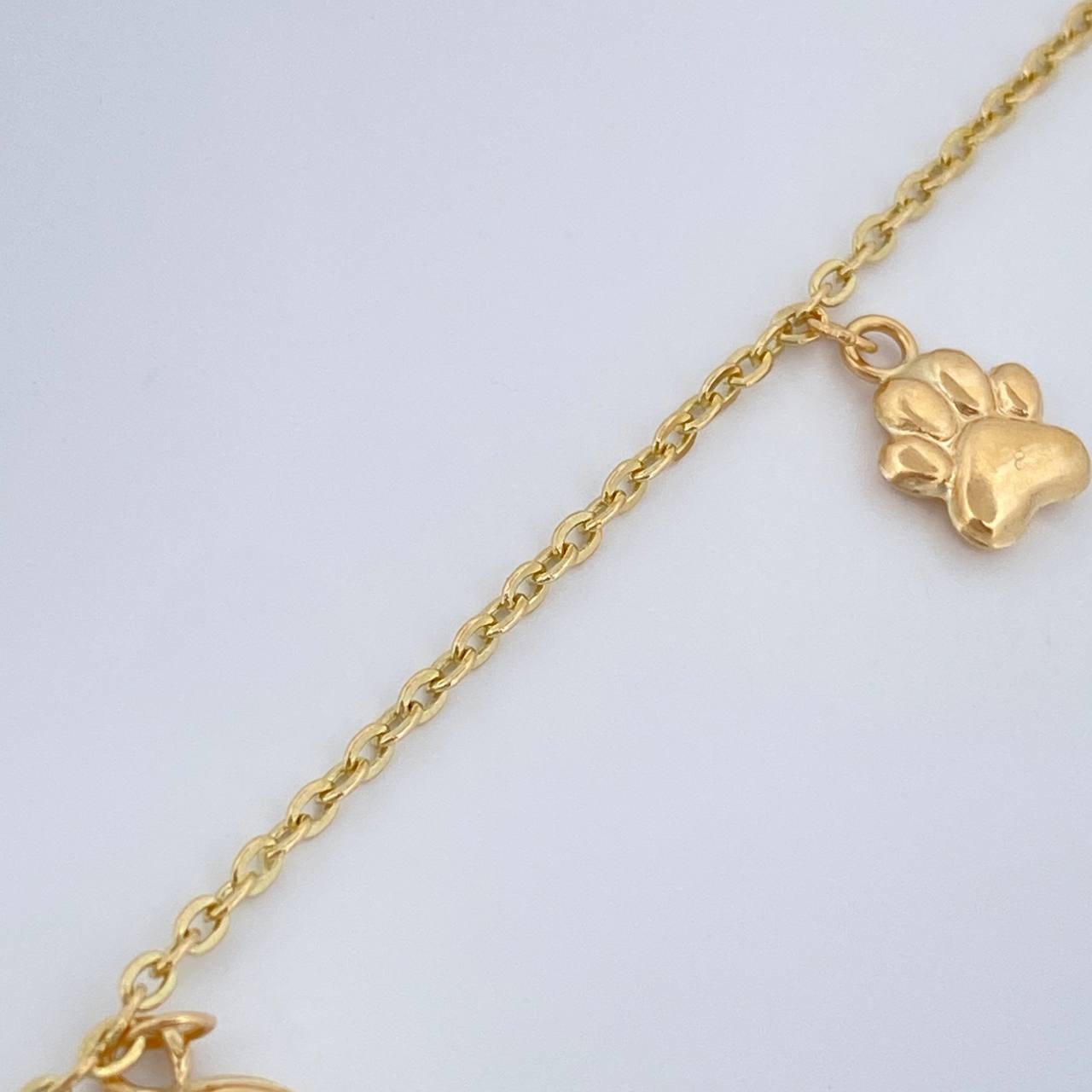 Tobillera Aro Seguido Figuras  3.55gr / 26cm / 1.5mm Oro Amarillo 18K %