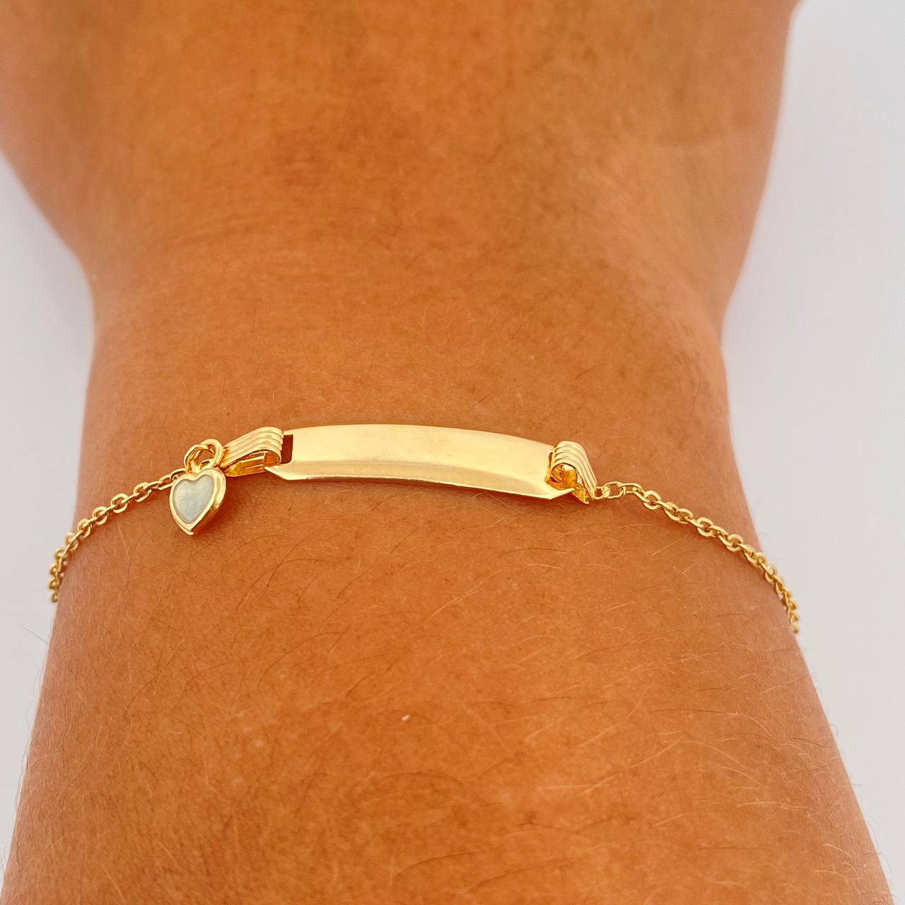 Pulso Bebé Aro Seguido Placa Octagonal 1.6gr / 14.7cm-16.2cm / 1.26mm Oro Amarillo 18K &