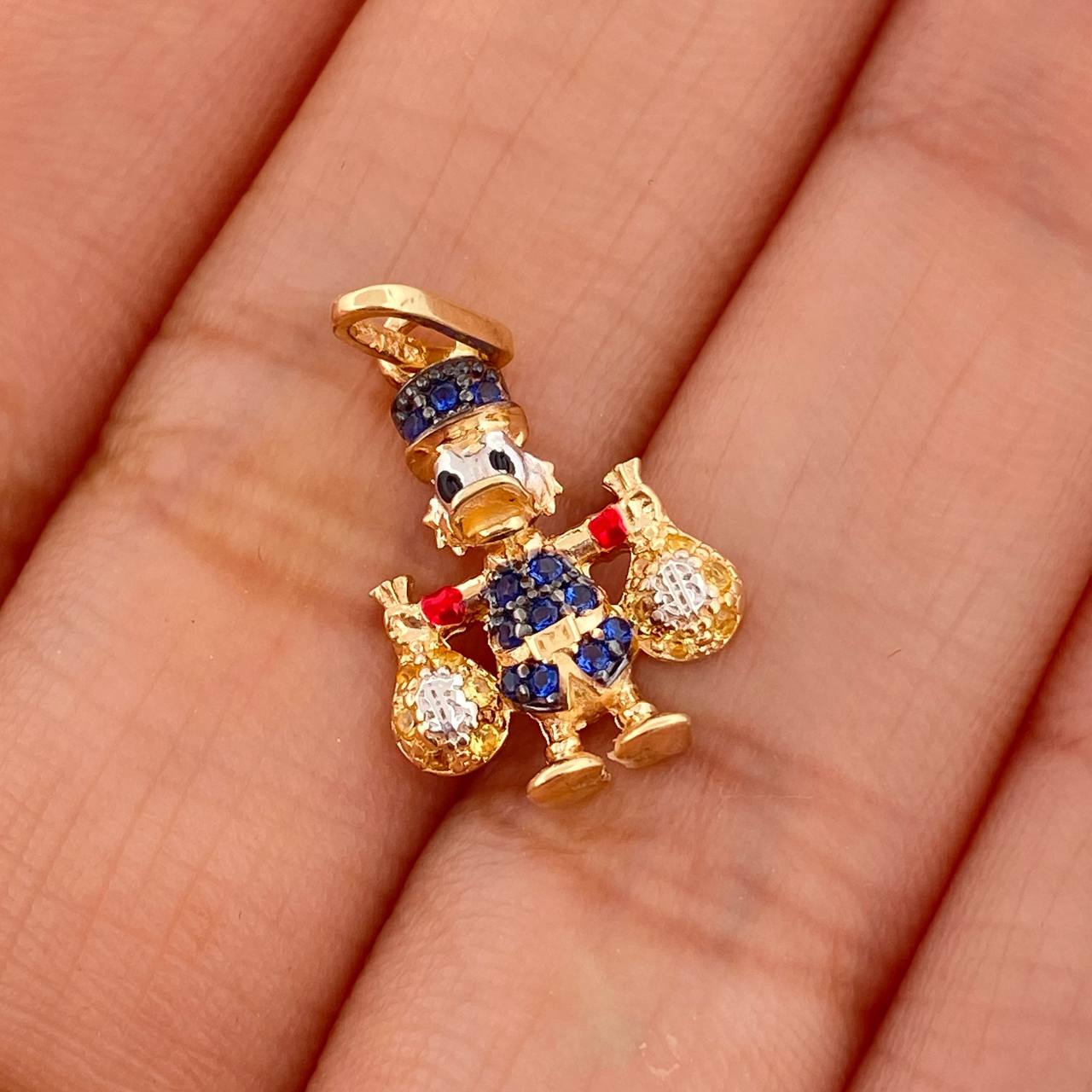 Dije Pato Bolsas De Dinero 1.6gr / 2.2cm / Tres Oros 18K %