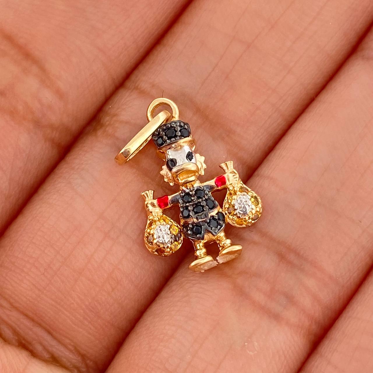 Dije Pato Bolsas De Dinero 1.45gr / 2.2cm / Tres Oros 18K %