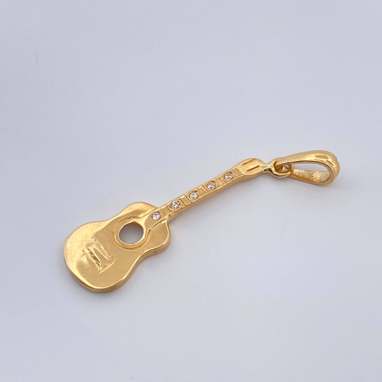 Dije Guitarra 1.3gr / 3.5cm / Oro Amarillo 18K %