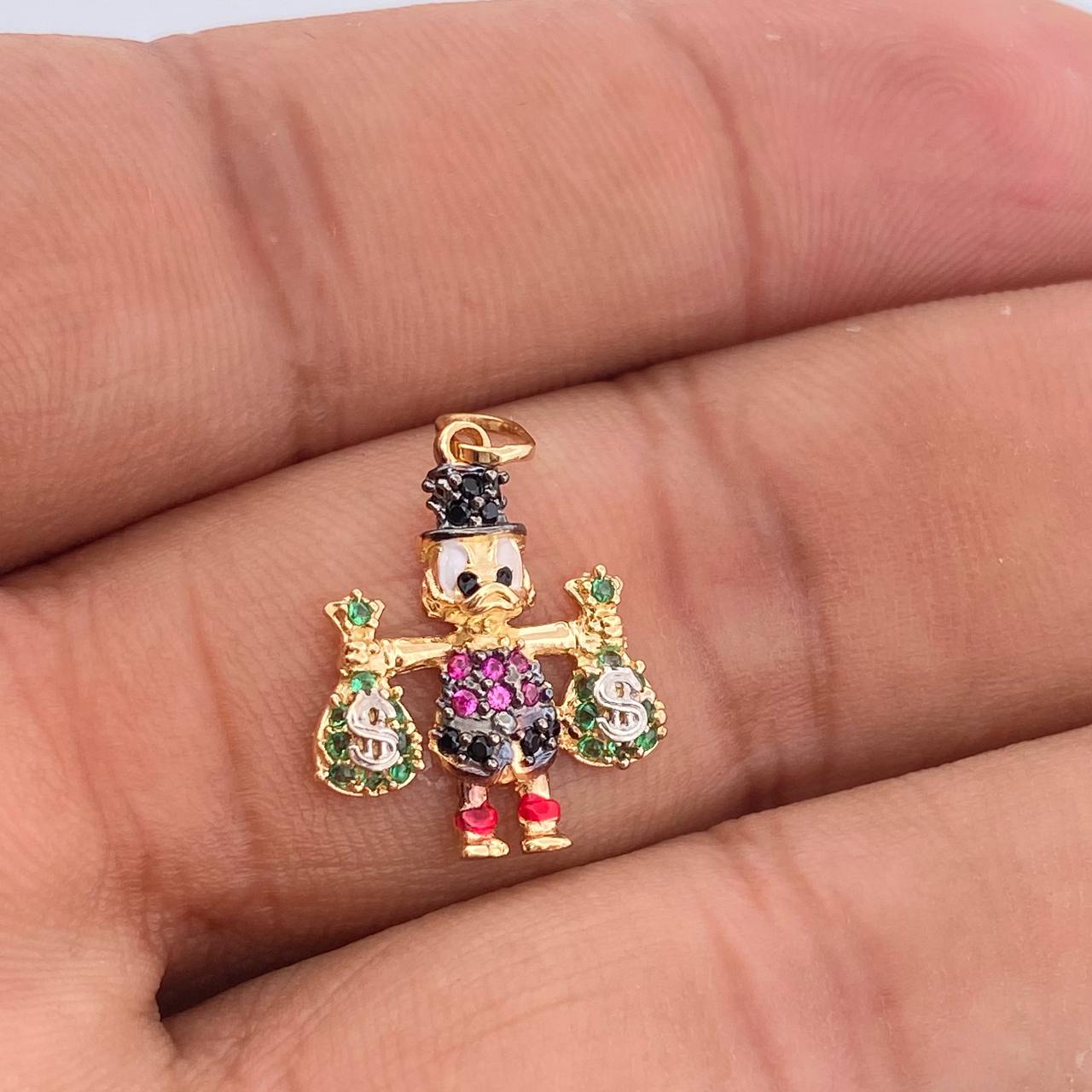 Dije Pato Bolsas De Dinero 1.6gr / 2.2cm / Tres Oros 18K %