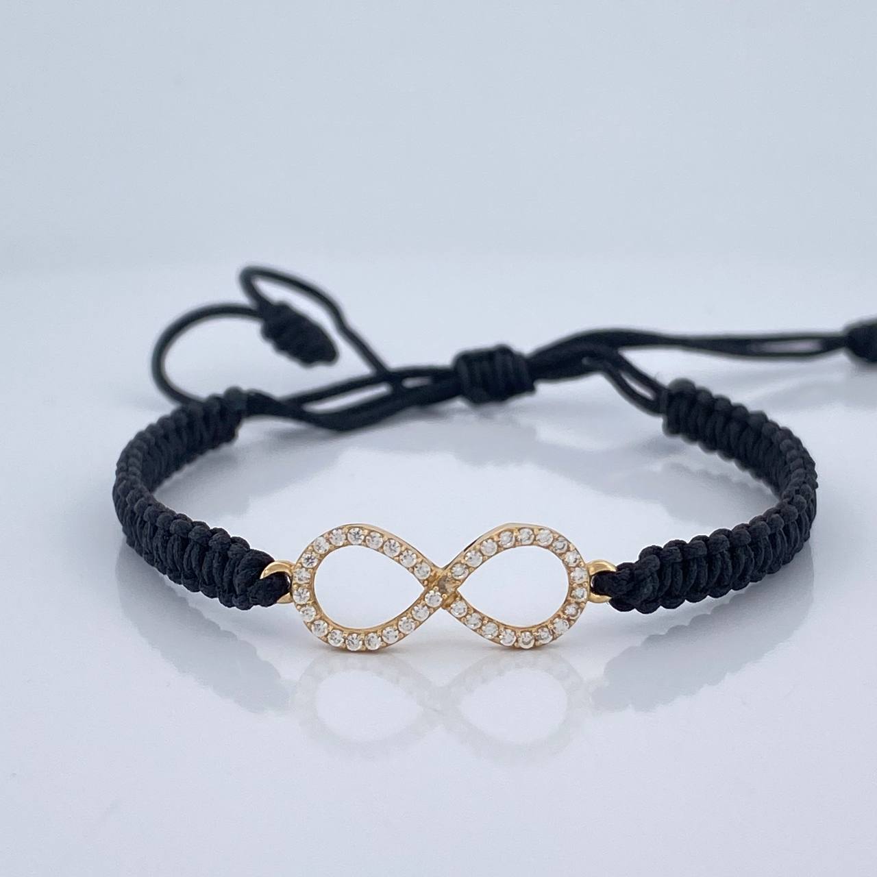 Pulsera Tejida Negra Infinito 0.85gr / Oro Amarillo 18K %