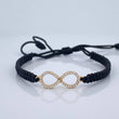 Pulsera Tejida Negra Infinito 0.85gr / Oro Amarillo 18K %