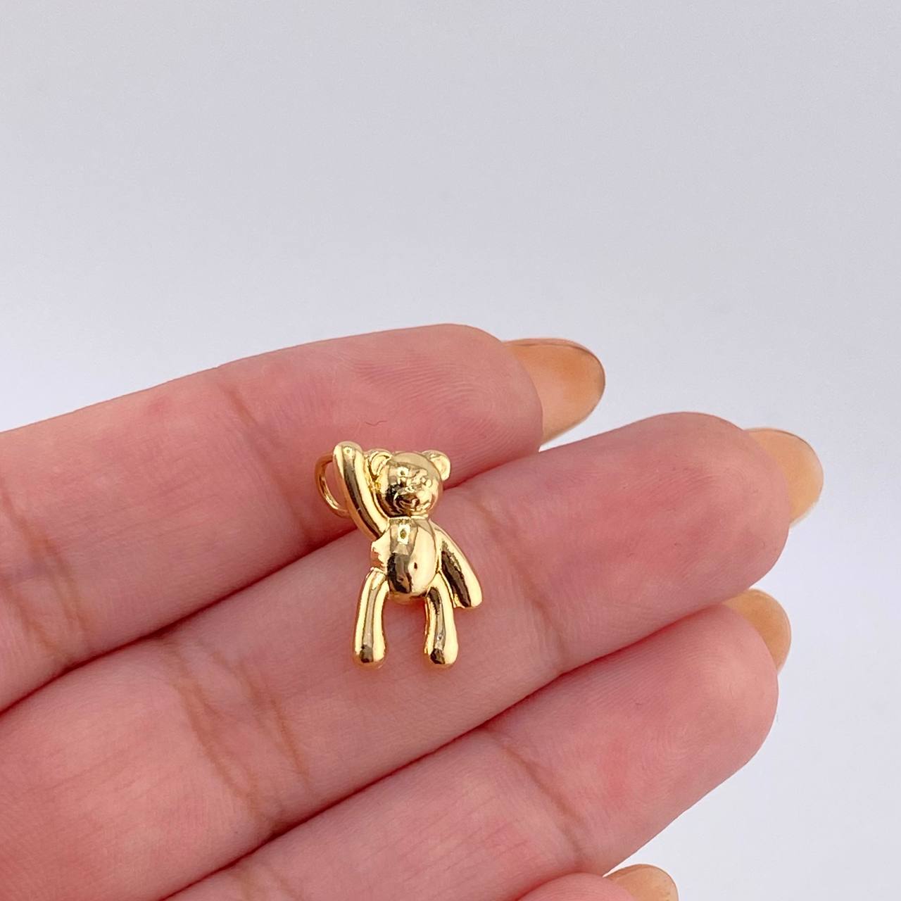 Dije Oso Mano Arriba 0.9gr / 1.6cm / Oro Amarillo 18K *