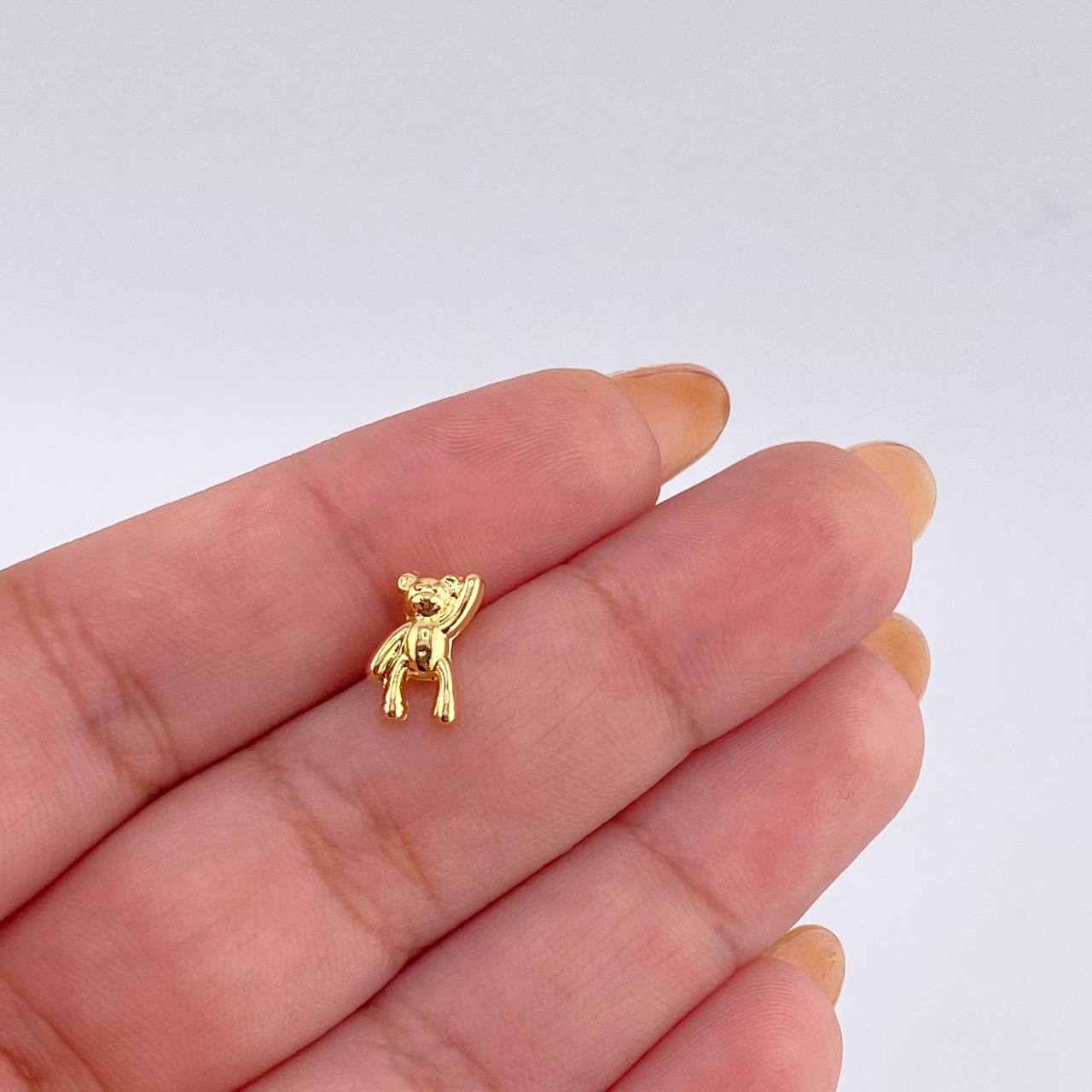 Dije Oso Mano Arriba 0.45gr / 1cm / Oro Amarillo 18K