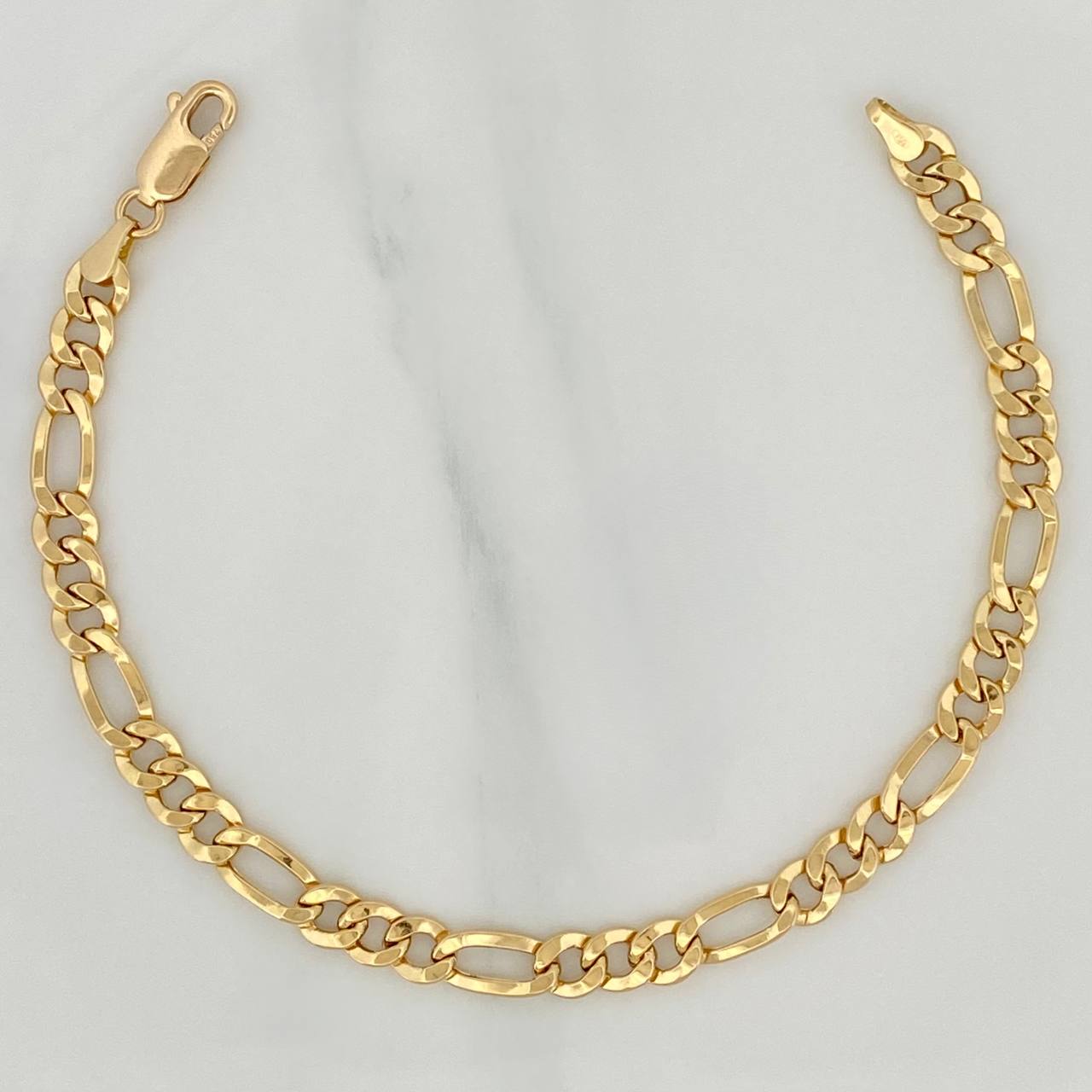 Pulso Figaro 3.85gr / 19cm / 5.25mm Oro Amarillo +1 18K $