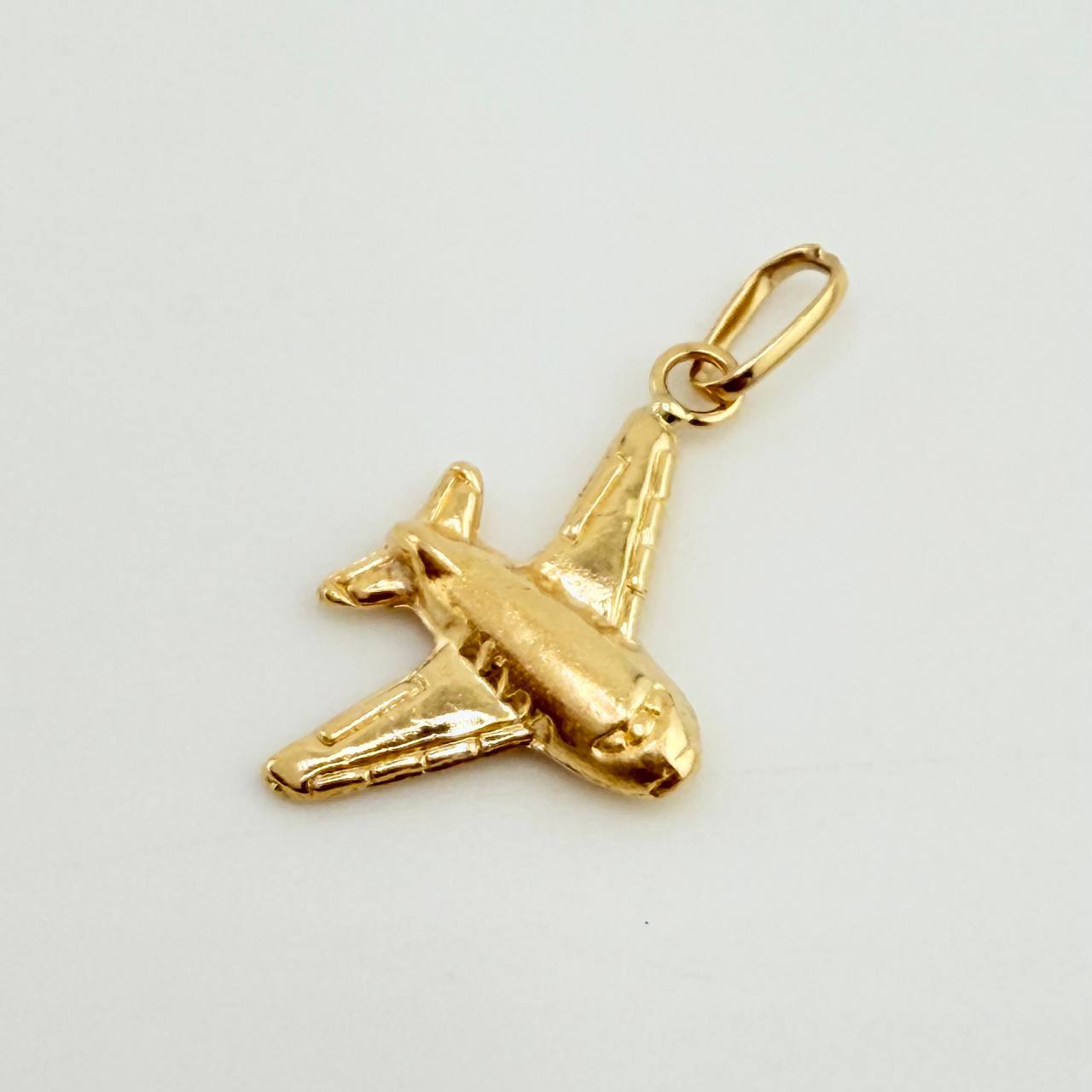 Dije Avión 0.5gr / 2.1 cm / Oro Amarillo 18K