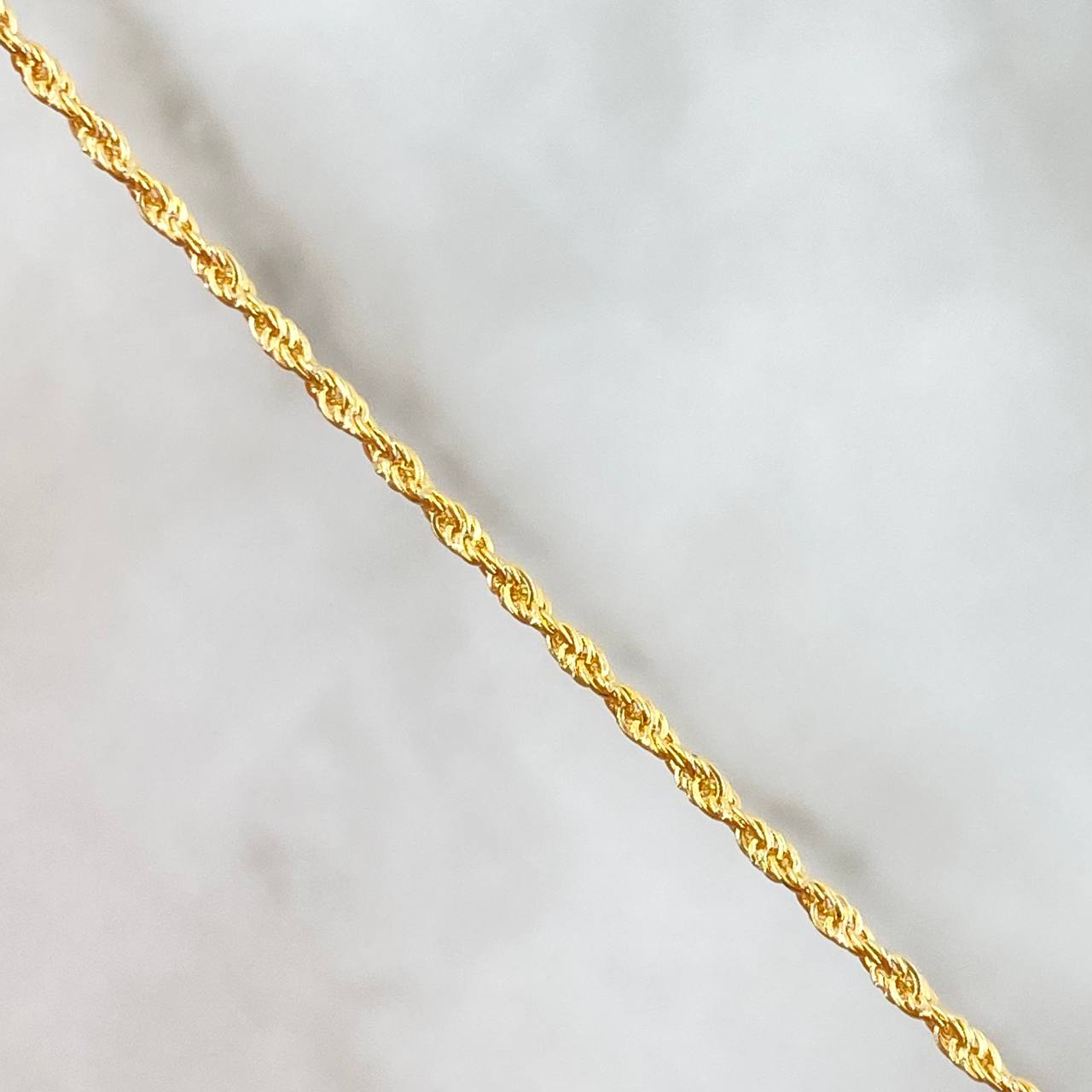 Cadena Lazo 1.1gr / 60cm + Dije Cruz Cristo Troquelada 0.35gr / 2cm Oro Amarillo (Oferta) ©