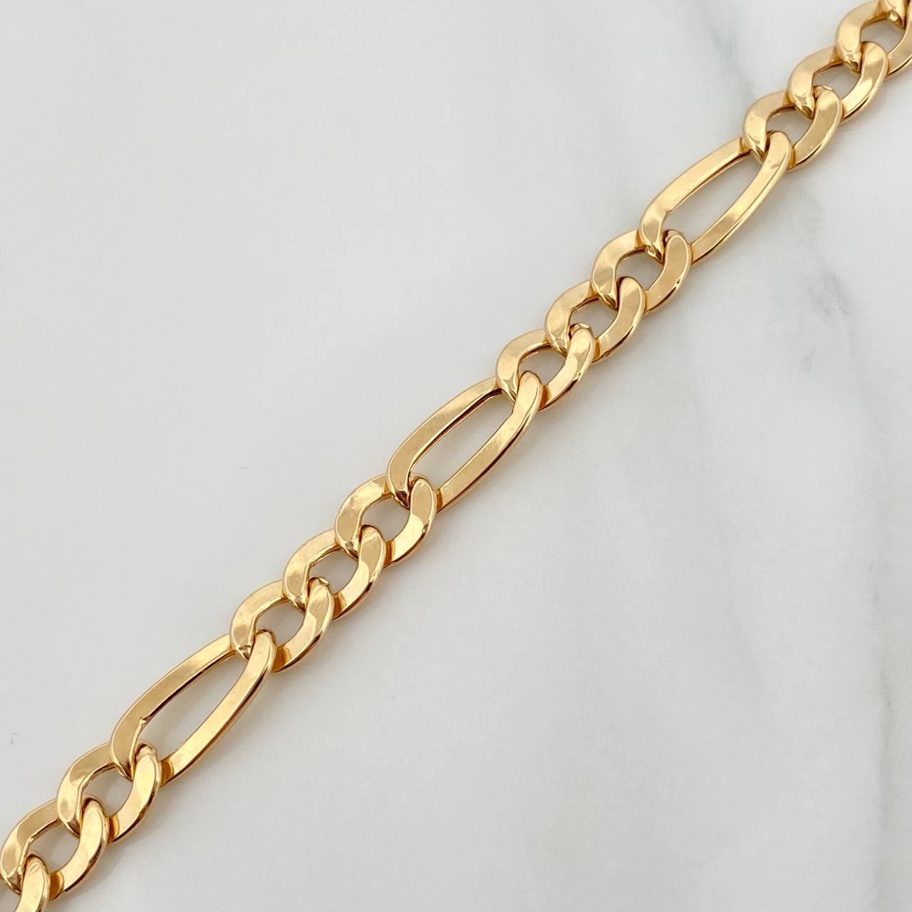 Pulso Figaro 6.1gr / 22cm / 6.3mm Oro Amarillo +1 18K %