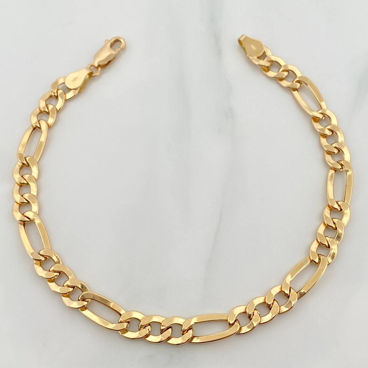 Pulso Figaro 6.1gr / 22cm / 6.3mm Oro Amarillo +1 18K %