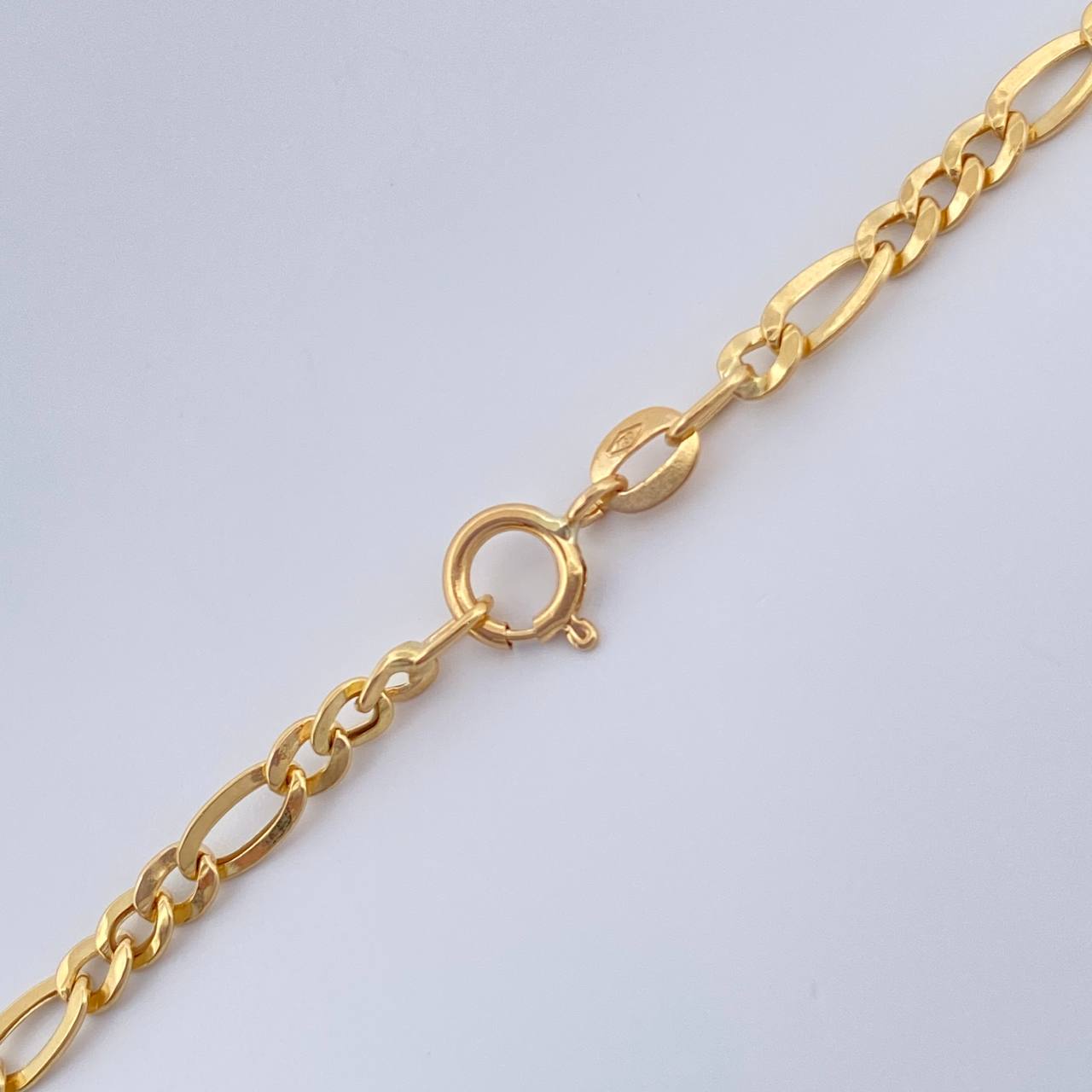 Cadena Figaro 6.35gr / 60.7cm / 3.14mm Oro Amarillo +1 18K %