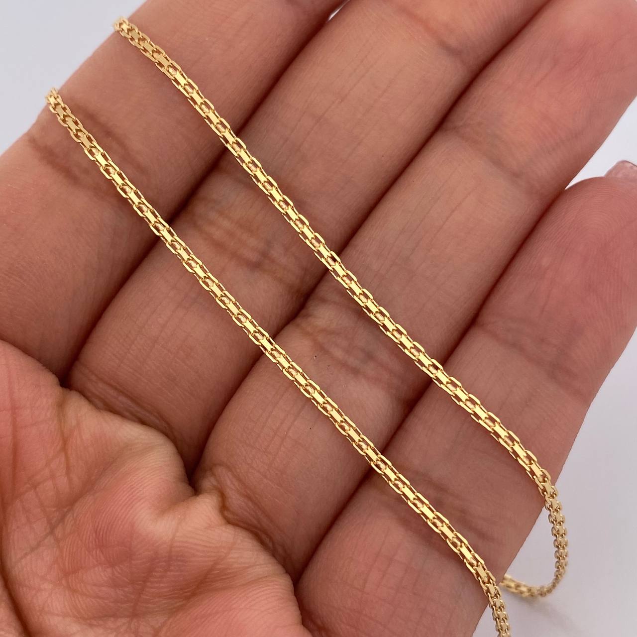 Cadena China 3.05gr / 60.4cm / 1.4mm Oro Amarillo +1 18K %