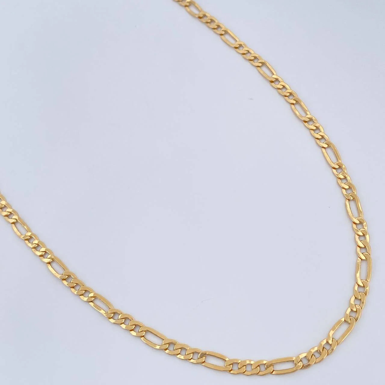Cadena Figaro 5.45gr / 60cm / 3.34mm Oro Amarillo +1 18K $