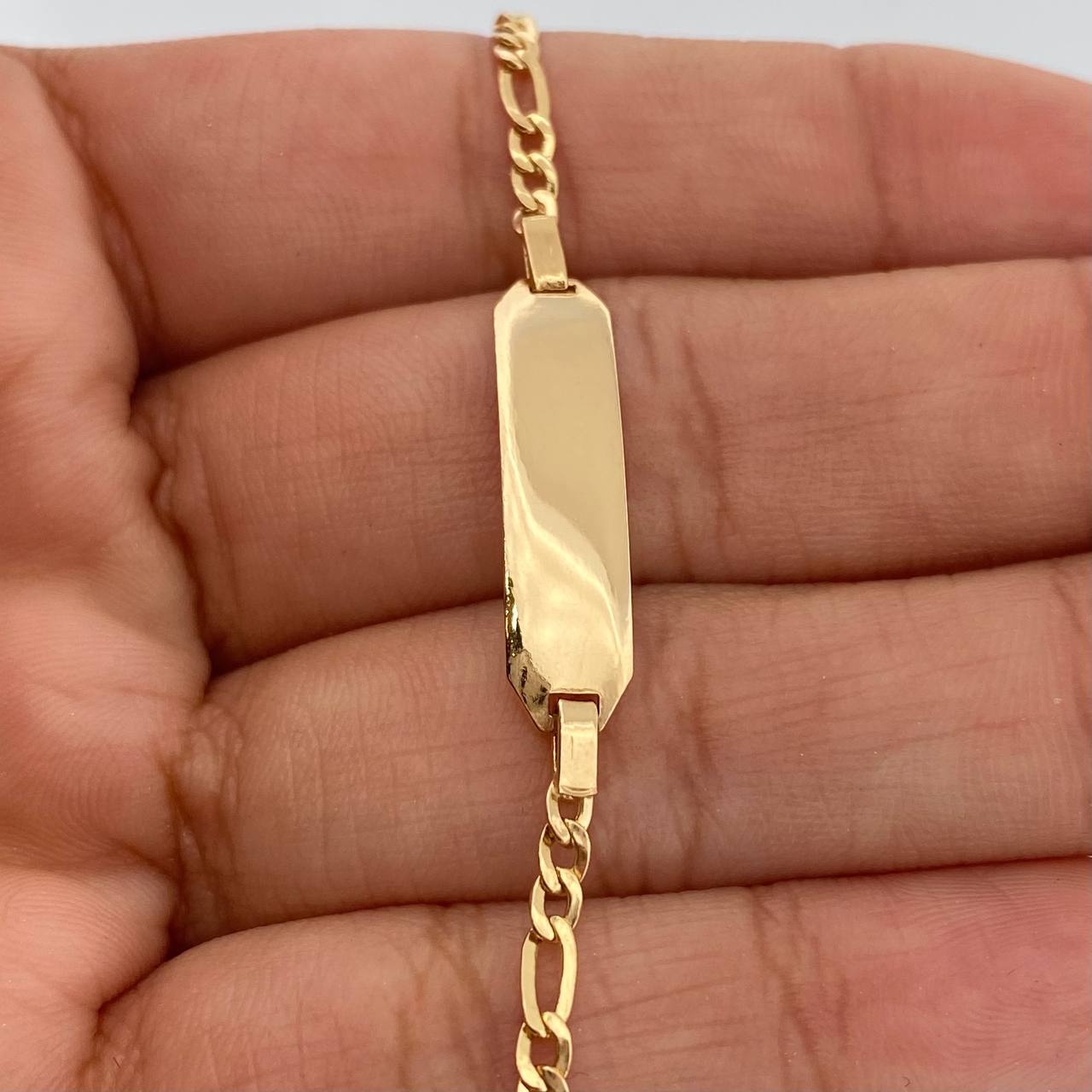 Pulso Placa Figaro 2.05gr / 15.3cm / 1.8mm Oro Amarillo +1 18K %