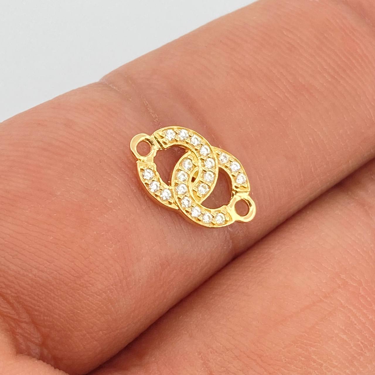 Herraje Olas Cruzadas 0.7gr / 1.3cm / Oro Amarillo 18K %
