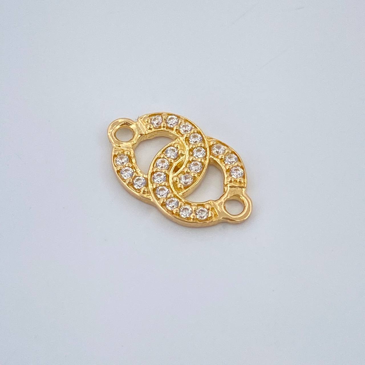 Herraje Olas Cruzadas 0.7gr / 1.3cm / Oro Amarillo 18K %