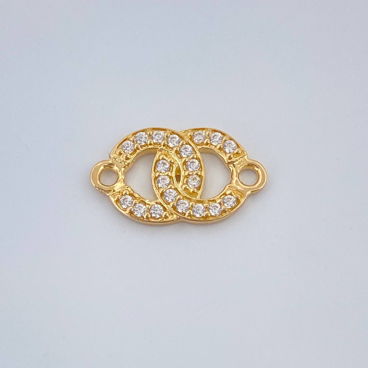 Herraje Olas Cruzadas 0.7gr / 1.3cm / Oro Amarillo 18K %