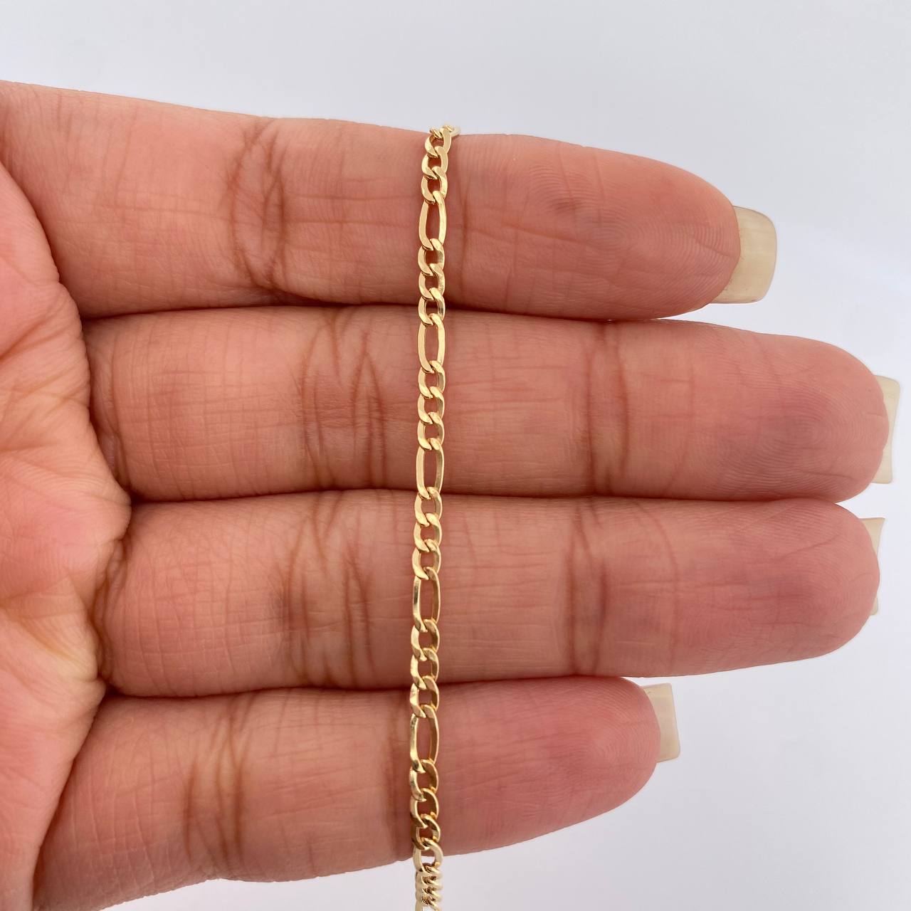 Pulso Figaro 1.3gr / 17.2cm / 2.3mm Oro Amarillo +1 18K %