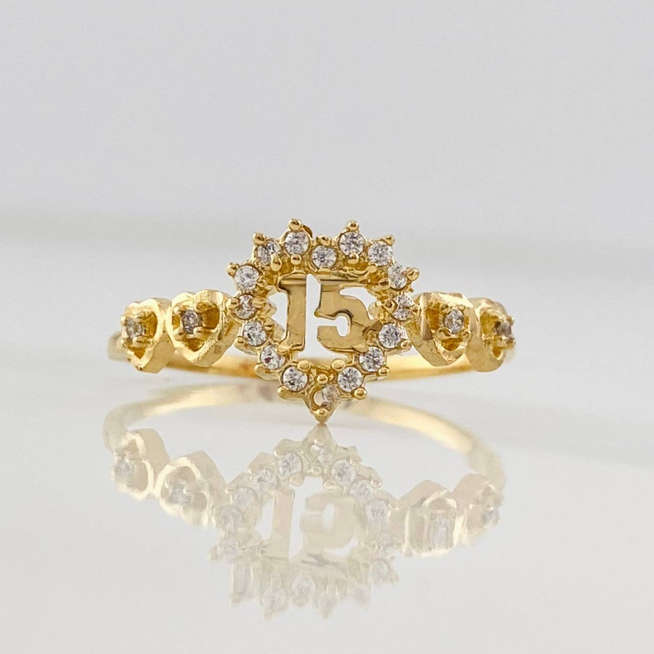 Anillo Corazones 15´s 1.6g / T7 1/2 Oro Amarillo 18K