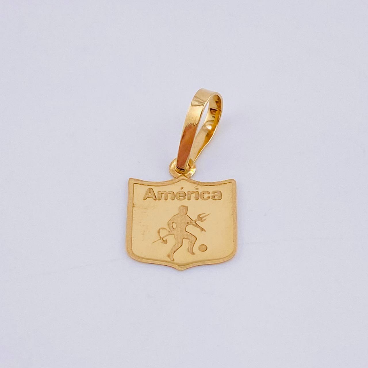 Dije Deportivo America 0.55gr / 2cm / Oro Amarillo 18K