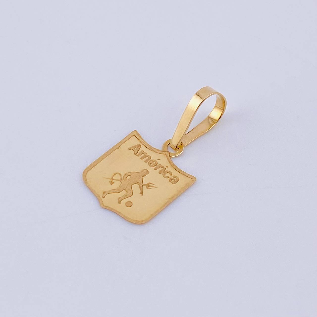 Dije Deportivo America 0.55gr / 2cm / Oro Amarillo 18K
