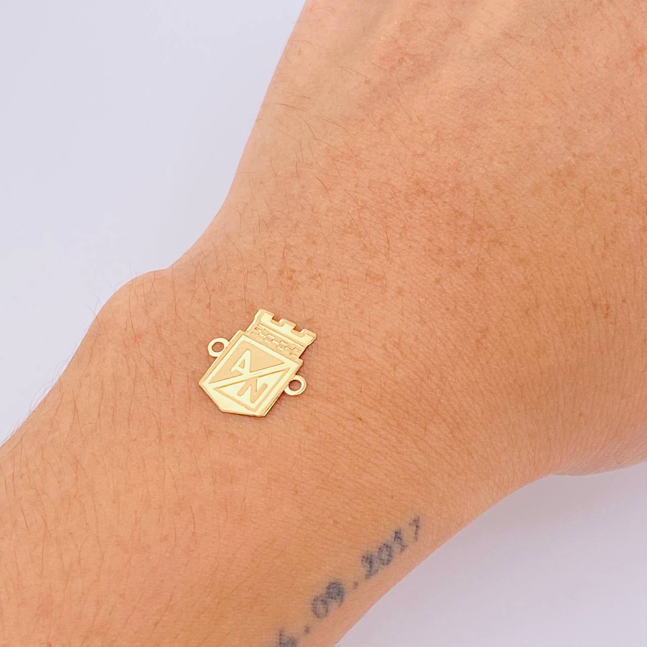 Herraje Escudo Atletico Nacional 0.35gr / 1.3cm / Oro Amarillo 18K ©