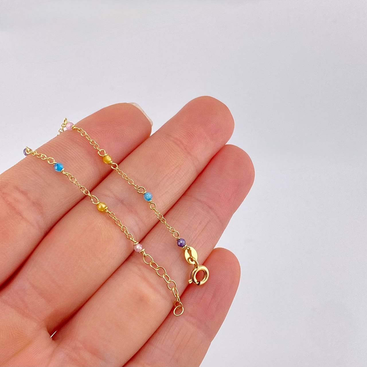 Pulso Modulable Aro Seguido Chispas Arcoiris 0.95g / 14.1cm - 12.4cm / 1.3mm Oro Amarillo 18K