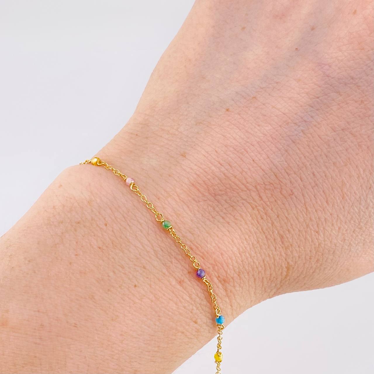 Pulso Modulable Aro Seguido Chispas Arcoiris 0.95g / 14.1cm - 12.4cm / 1.3mm Oro Amarillo 18K