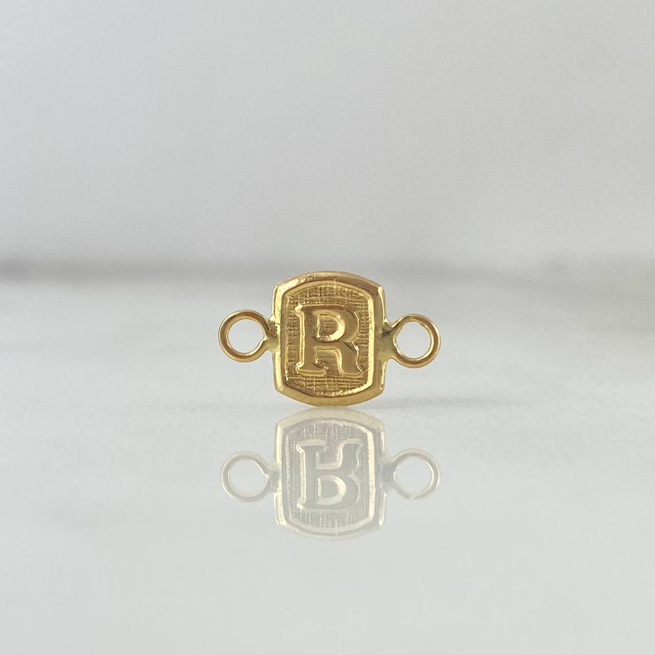 Herraje Letra R 0.35gr / 1.3cm / Marco Cuadrado Oro Amarillo