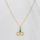 Set Cadena Aro Seguido + Dije Infinito Esmeralda 0.7pts / 1.45g / 50cm Oro Amarillo 18K