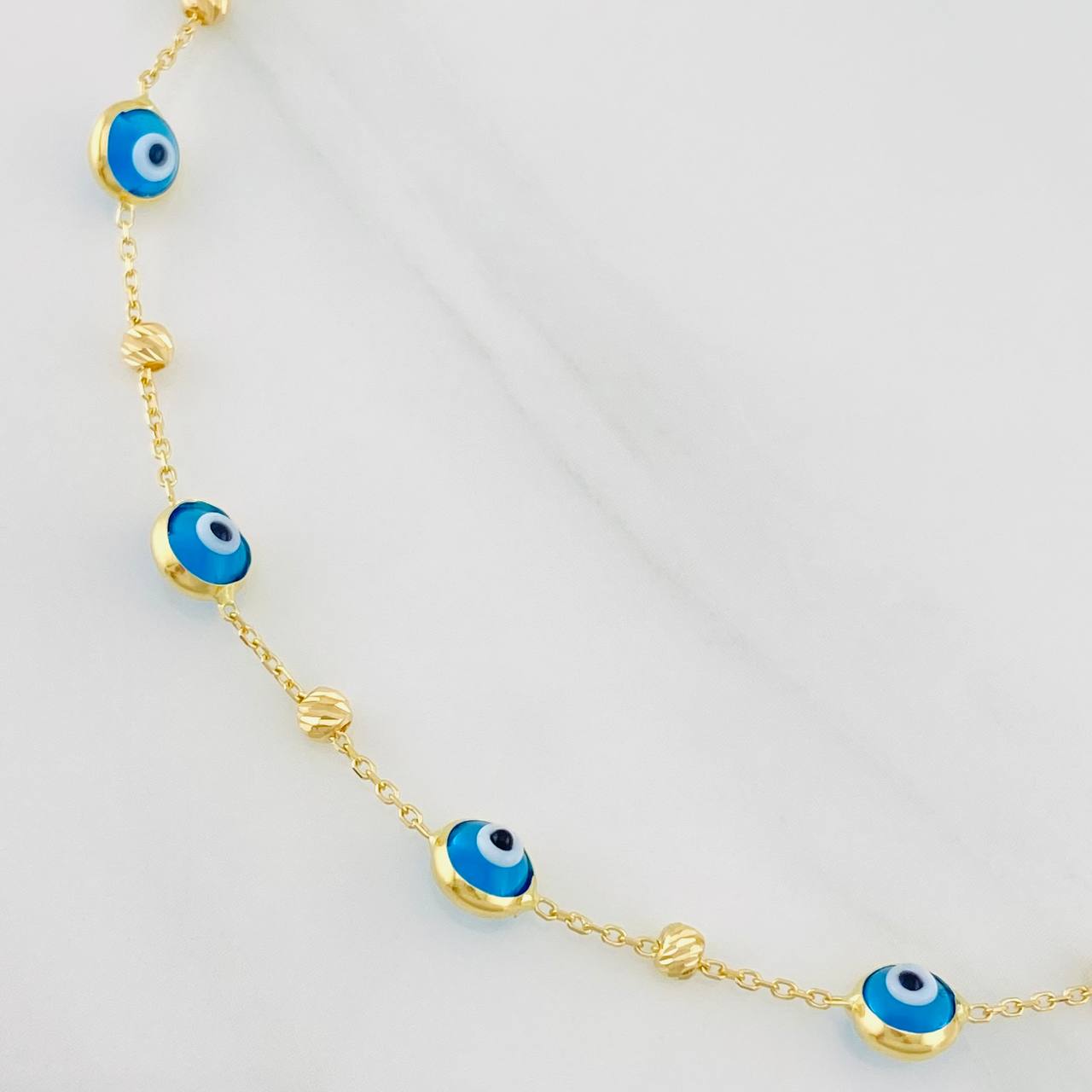 Pulso Aro Seguido Ojos Turcos 2.2g / 19.7cm / 0.85mm Oro Amarillo 18K