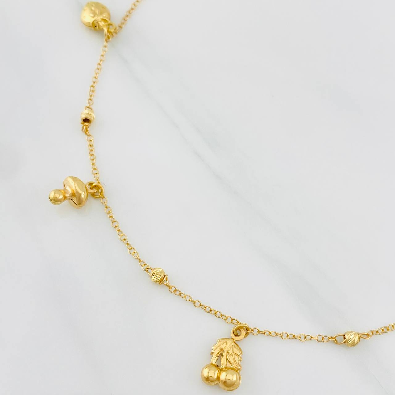 Tobillera Aro Seguido Figuras 3.55g / 25cm / 1.33mm Oro Amarillo 18K
